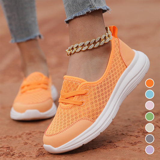 Andningsbara damskor med platt sula och slip-on-design