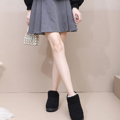 Varma, fluffiga slip-in boots för dam